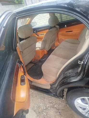 Транспорт: Daewoo Magnus: 2001 г., 2 л, Механика, Бензин, Седан — 4