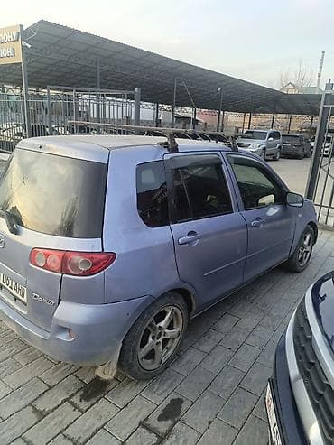 полики на демио: Mazda Demio: 2006 г., 1.3 л, Автомат, Газ, Хэтчбэк — 2