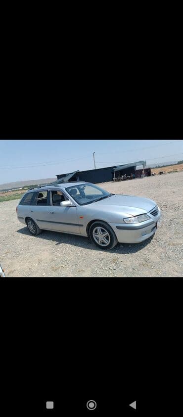 автомобили для инвалидов с ручным управлением: Mazda Capella: 2001 г., 1.9 л, Механика, Бензиновая, Универсал — 1