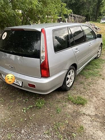 мтз 9: Mitsubishi Lancer: 2003 г., 1.6 л, Механика, Газ, Универсал — 1