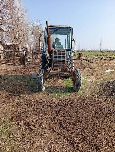 Тракторы YTO (ЮТО): Трактор колесный с кабиной, класс МТЗ-80/82 (ориентировочно) — 2