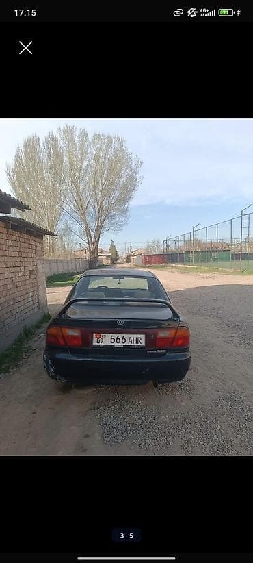 mazda 3: Mazda 323: 1996 г., 1.8 л, Механика, Седан — 4