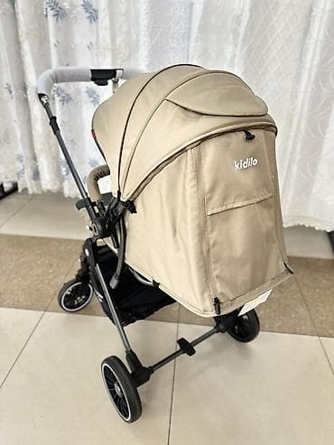 Прогулочная коляска Kidilo, бежевый цвет. Основные особенности: - — 3