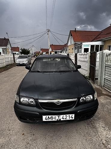 Унаа сатуу: Mazda 626: 1997 г., 1.8 л, Кол менен иштөөчү, Бензин, Хетчбек — 8