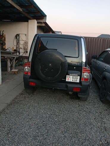 пакрышка на матиз: Ssangyong Korando: 2002 г., 2.3 л, Автомат, Бензиновая, Внедорожник — 8