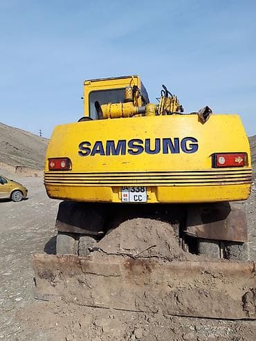 daewoo k2: Экскаватор, Samsung, 1995 г., Колесный — 1