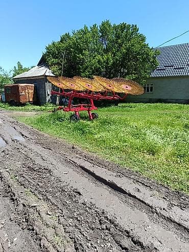 Транспорт: Грабли-ворошилка колесно-пальцевая, прицепная к трактору. - — 3