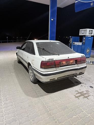 не нужное: Mazda 626: 1991 г., 2 л, Механика, Бензин, Седан — 5