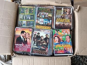 CD, DVD диски: Оптовый лот DVD-дисков с фильмами и сериалами на русском языке — 2