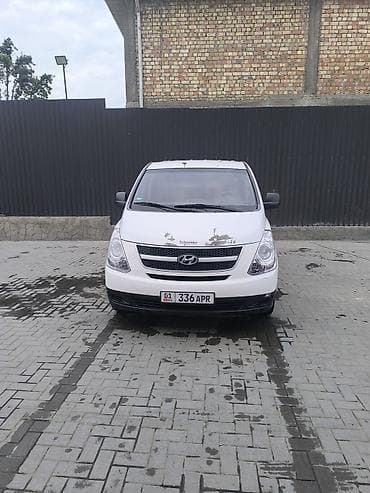 ми 10 с: Hyundai H-1 (Starex) фургон, белый цвет, кузов длинный. Особенности — 2
