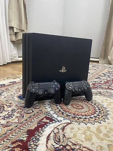 PlayStation 4 Pro (черная) + 2 оригинальных беспроводных геймпада