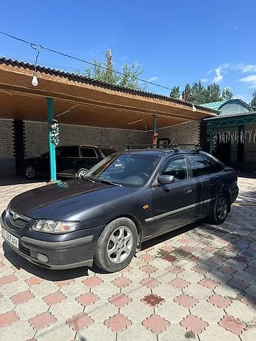 Mazda 626: 1999 г., 1.8 л, Механика, Бензин, Седан