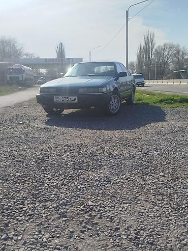глушитель мазда 6: Mazda 626: 1991 г., 2 л, Механика, Бензин, Седан — 5