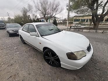 дорогие машины: Mazda Millenia: 1999 г., Седан — 2