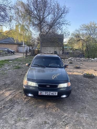 Daewoo Nexia: 2002 г., 1.5 л, Механика, Бензин, Седан