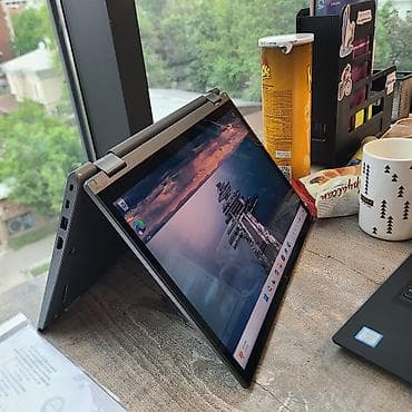 hyper x: Ноутбук Lenovo ThinkPad в корпусе серого цвета, оснащенный процессором — 9