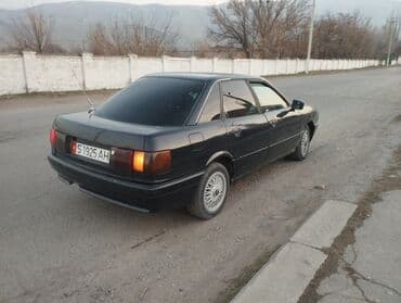 Легковой седан, черный цвет, 4 двери. Кузов классических пропорций