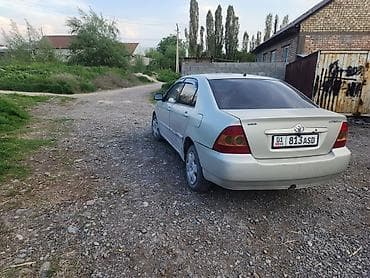 салон машины: Toyota Corolla: 2005 г., 1.6 л, Механика, Бензин, Седан — 10
