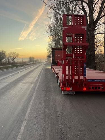 124 е: Прицеп, Volvo, Трал — 3