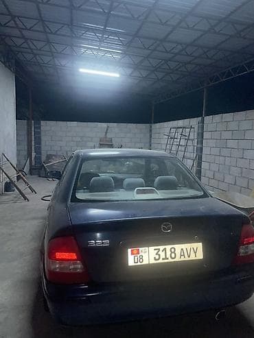 кузов нексия 2: Mazda 323: 1999 г., 1.6 л, Механика, Бензин, Седан — 4