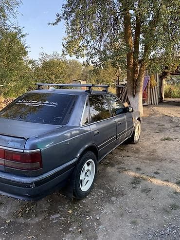 Транспорт: Mazda 626: 1988 г., 2 л, Кол менен иштөөчү, Седан — 2