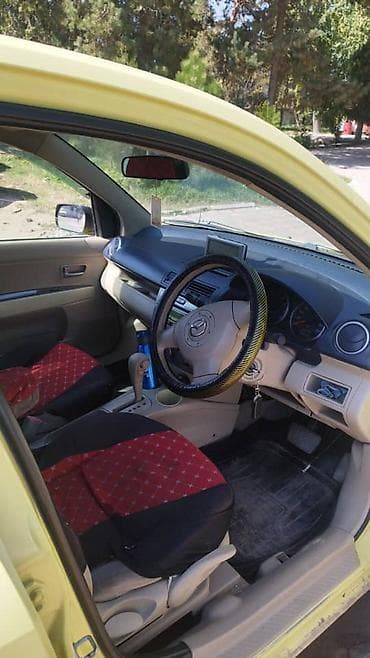 женский авто: Mazda Demio: 2004 г., 1.5 л, Автомат, Бензин, Хэтчбэк — 2