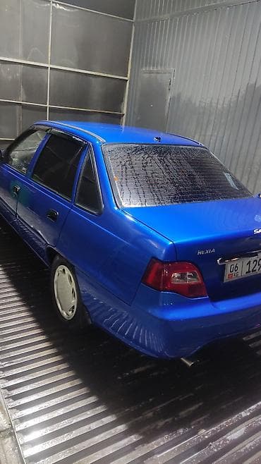 Daewoo Nexia: 2012 г., 0.5 л, Механика, Бензин, Седан