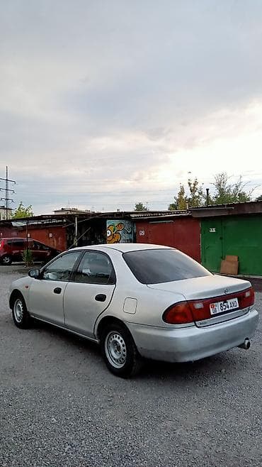 чон арыке: Mazda 323: 1995 г., 1.5 л, Автомат, Бензин — 4