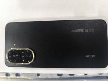 телефон редии: Redmi, Redmi 5A, Новый, 64 ГБ, цвет - Черный, 2 SIM — 3