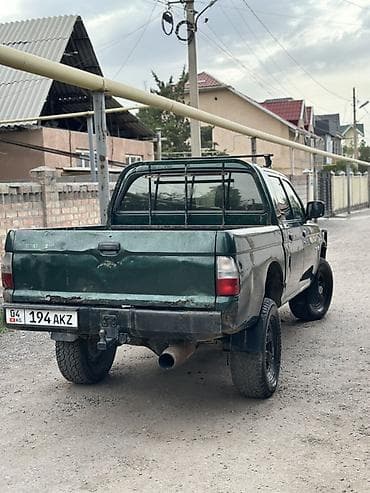 шины lt: Mitsubishi L200: 2002 г., 2.5 л, Механика, Бензин, Пикап — 6