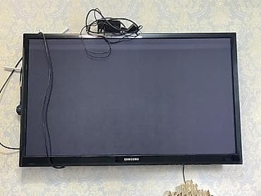 Телевизоры: Телевизор Samsung, диагональ примерно 40–42". Плоская панель с — 2