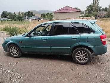 кассеты аудио: Mazda 323: 2003 г., 1.6 л, Автомат, Хэтчбэк — 5