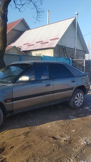 Mazda 323: 1990 г., 1.6 л, Механика, Бензин, Хэтчбэк
