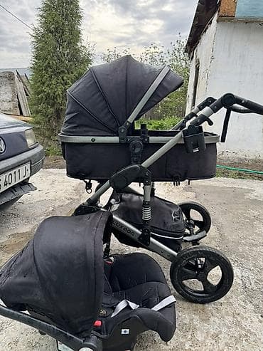 дорожная коляска: Коляска, Другой бренд, цвет - Черный, Б/у — 1