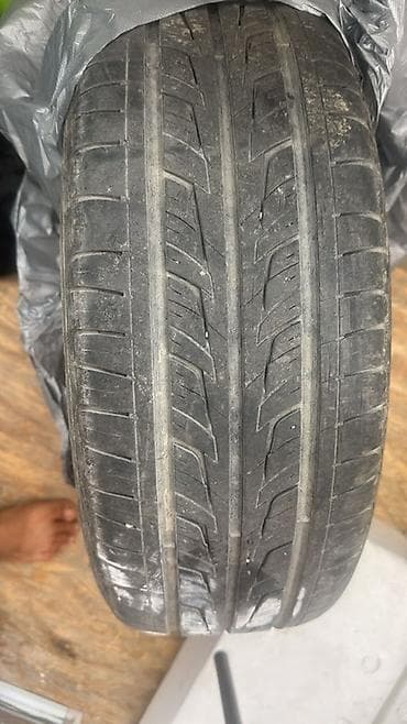 Шины и диски: Летняя шина 205/55 R16 94H, производство Россия. Характеристики: - — 2