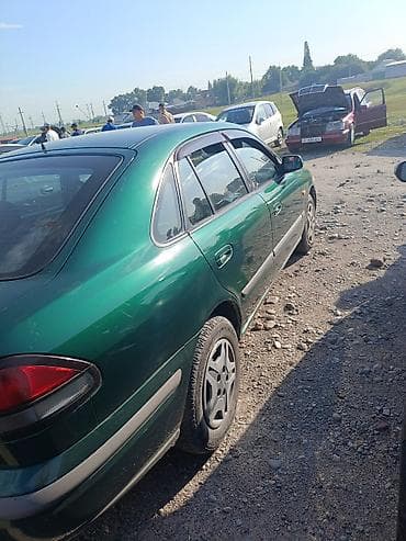 е34 540: Mazda 626: 1998 г., 0.2 л, Механика, Бензин, Хэтчбэк — 4