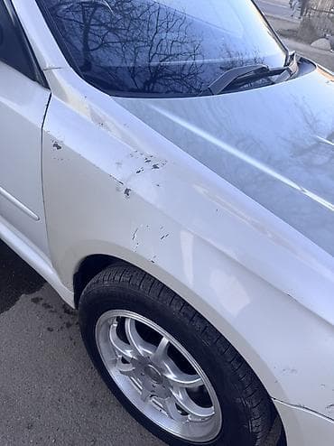морда: Subaru Legacy: 2003 г., Бензин, Седан — 8