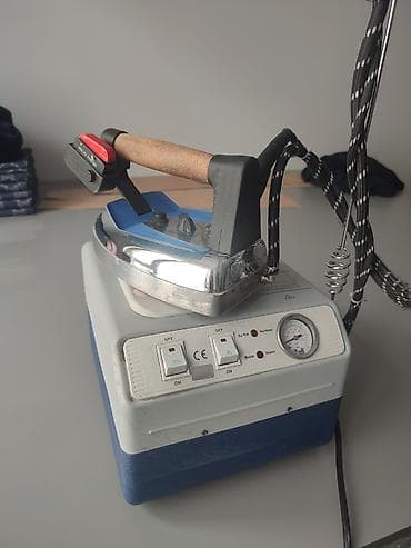 линеный нож: Профессиональный парогенераторный утюг Silter Super Mini 2002 - — 1