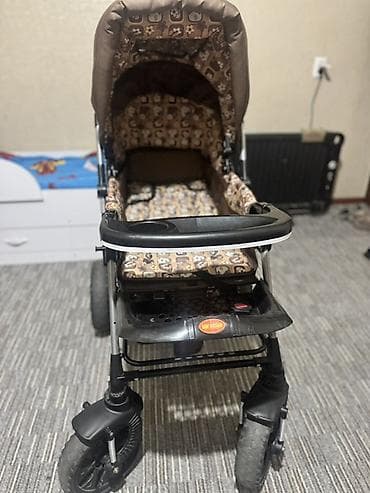 прогулочная коляска: Прогулочная коляска с поворотными передними колесами - Тип — 2