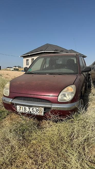 145 13: Daihatsu Sirion: 1998 г., 1 л, Механика, Бензин, Хэтчбэк — 2