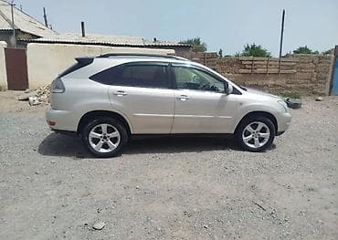 Детали салона: Lexus RX 330) — интерьер и оснащение - Рулевое колесо с — 8