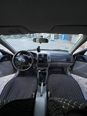 гофра для авто: Mazda Familia: 2002 г., 1.6 л, Механика, Бензин, Универсал — 7