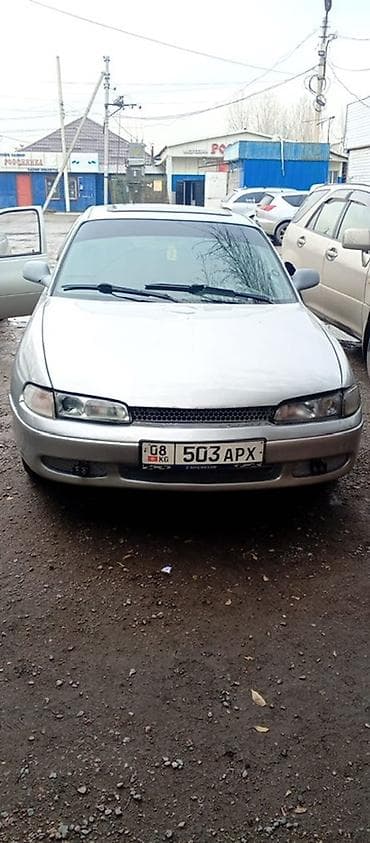 задний стоп мазда 323: Mazda Cronos: 1993 г., 1.8 л, Механика, Бензин, Седан — 4