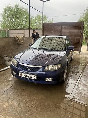kukirin g2 pro max: Mazda Familia: 2002 г., 1.6 л, Автомат, Бензин, Седан — 2