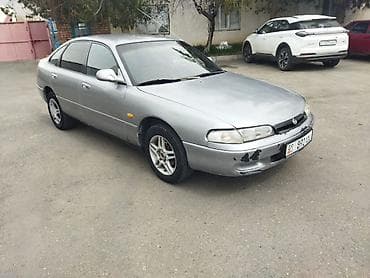 кузов таза: Mazda 626: 1992 г., Лифтбек — 1
