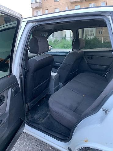 тез арада: Daewoo Nexia: 2010 г., 1.6 л, Кол менен иштөөчү, Бензин, Седан — 5