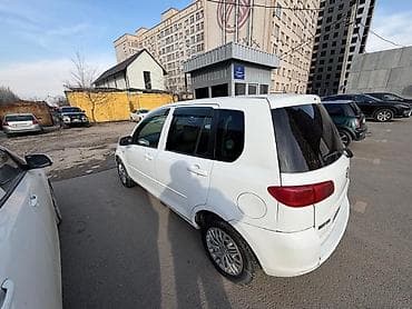 mazda 3: Mazda Demio: 2003 г., 1.3 л, Автомат, Бензин, Седан — 6