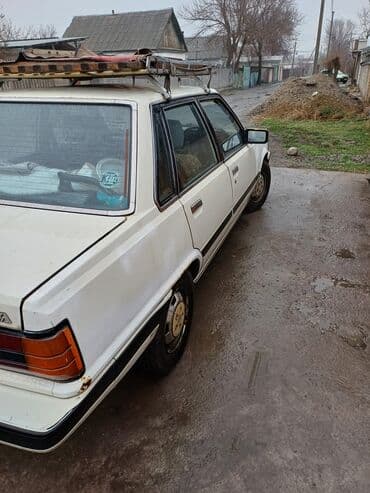 виш диска: Toyota Vista: 1983 г., 1.8 л, Механика, Бензин, Седан — 2