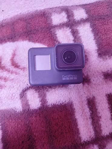 проекторы для кинотеатров: Экшн‑камера GoPro HERO5 Black - Компактная экшн‑камера в фирменном — 1