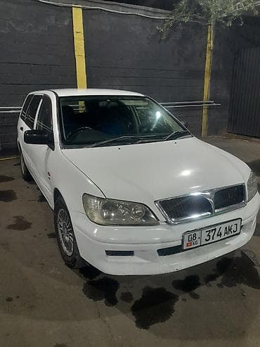 Mitsubishi lancer cedio 2001 года выпуска объем 1.8 по мотору и